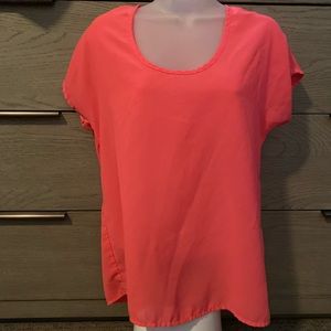 Shear top with zipper on back